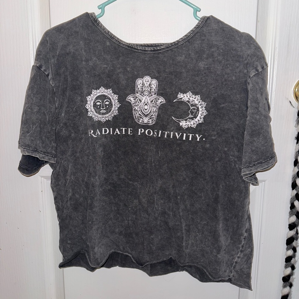 Grey T-shirt.
